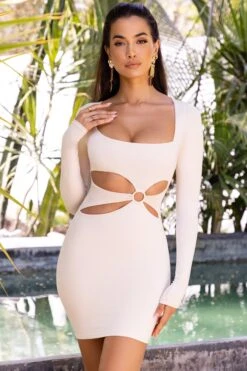 Cut Out Long Sleeve Mini Dress In Cream -Pretty Dresses Sales 4051 1 sunset haven cream cut open front hoop detailing long sleeve mini dress
