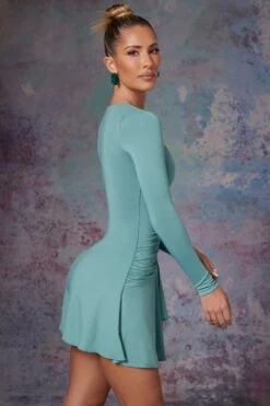 Long Sleeve Waterfall Skirt Mini Dress In Light Teal 9 Long Sleeve Waterfall Skirt Mini Dress In Light Teal -Pretty Dresses Sales 5473 5 Lili Blue Long Sleeve Halter Neck Mini Dress With Waterfall Skirtcopy